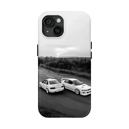 Two White Subaru Impreza WRX On Road