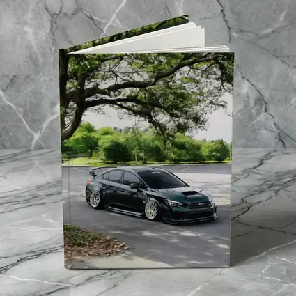 Subaru WRX STI Slammed Under Green Trees