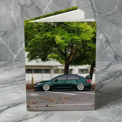 Subaru WRX STI Slammed Green Parking Lot