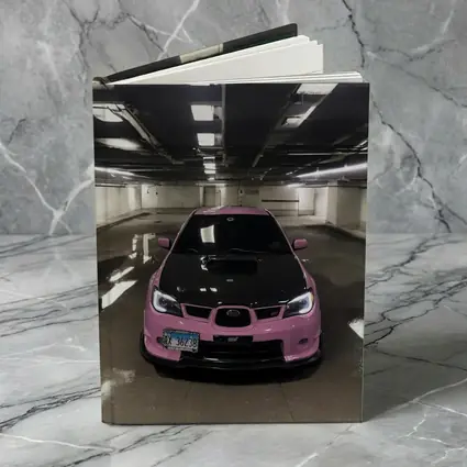 Pink Subaru WRX STI Underground Parking Garage