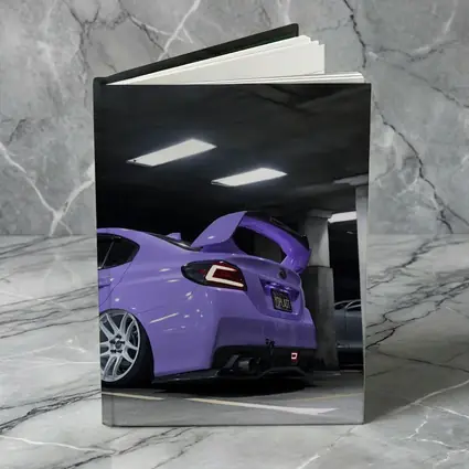 Purple Subaru WRX Parked Underground Garage