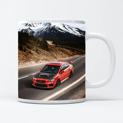 Red Subaru WRX STI Snowy Mountain Road
