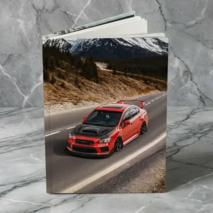 Red Subaru WRX STI Snowy Mountain Road