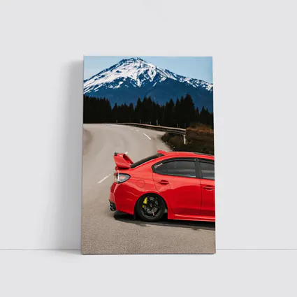 Red Subaru WRX STI Snowy Mountain Road