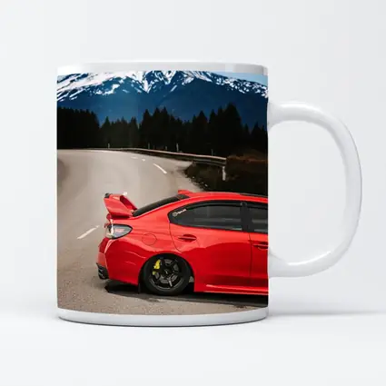 Red Subaru WRX STI Snowy Mountain Road