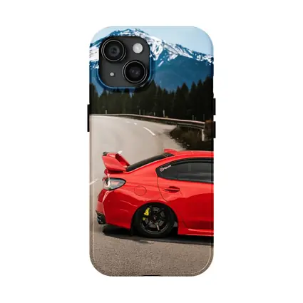 Red Subaru WRX STI Snowy Mountain Road
