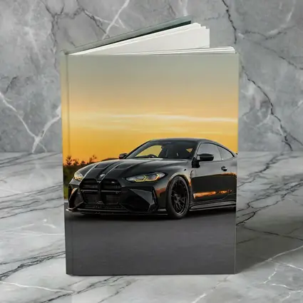 Black BMW M4 Coupe Sunset Track