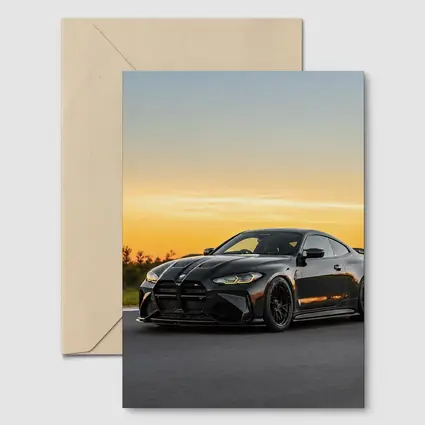 Black BMW M4 Coupe Sunset Track