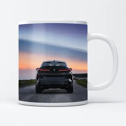 BMW X6M Rear View Sunset Road