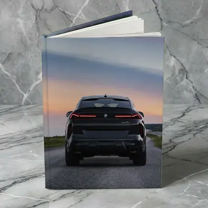 BMW X6M Rear View Sunset Road