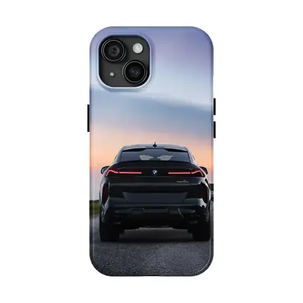 BMW X6M Rear View Sunset Road