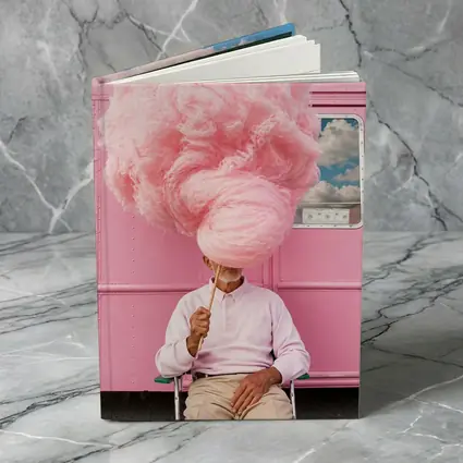 Man Holding Giant Pink Cotton Candy Outdoors