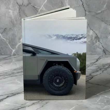 Tesla Cybertruck Parked Near Snowy Mountain Fog