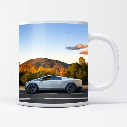 Tesla Cybertruck Driving Through Autumn Mountain Road
