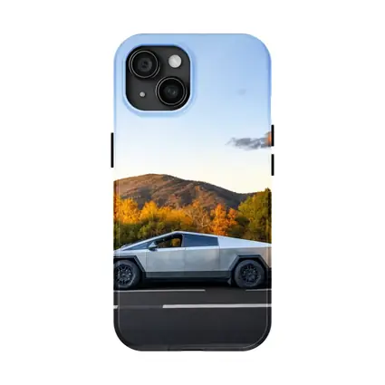 Tesla Cybertruck Driving Through Autumn Mountain Road