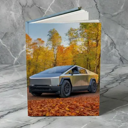 Tesla Cybertruck Parked Among Autumn Trees