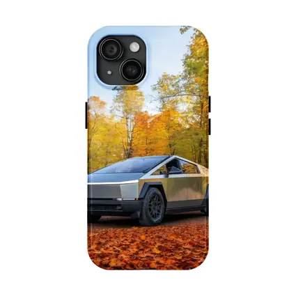 Tesla Cybertruck Parked Among Autumn Trees