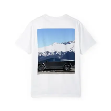 Tesla Cybertruck Parked Against Snowy Mountains