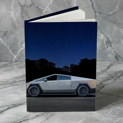Tesla Cybertruck Parked Under Starry Night Sky