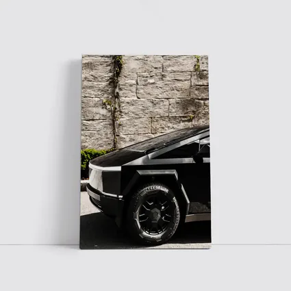 Tesla Cybertruck Black Against Stone Wall