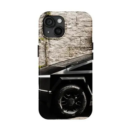 Tesla Cybertruck Black Against Stone Wall