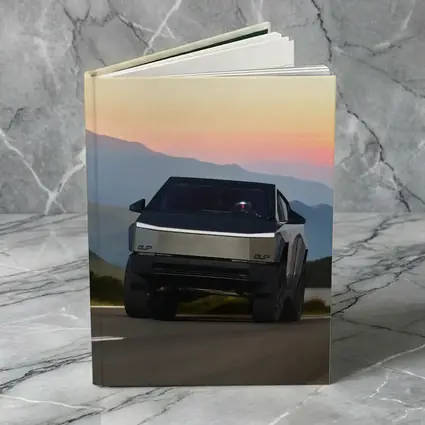 Tesla Cybertruck Driving Mountain Sunset Road