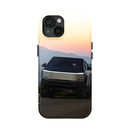 Tesla Cybertruck Driving Mountain Sunset Road