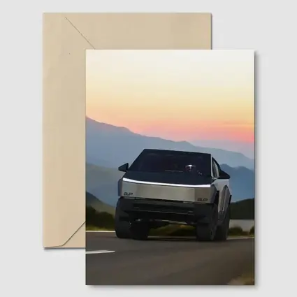 Tesla Cybertruck Driving Mountain Sunset Road