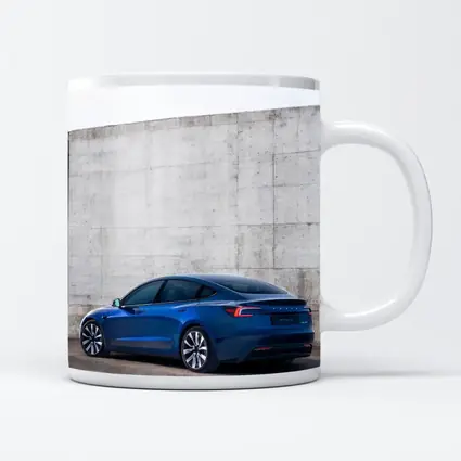 Tesla Model 3 Blue Against Concrete Wall