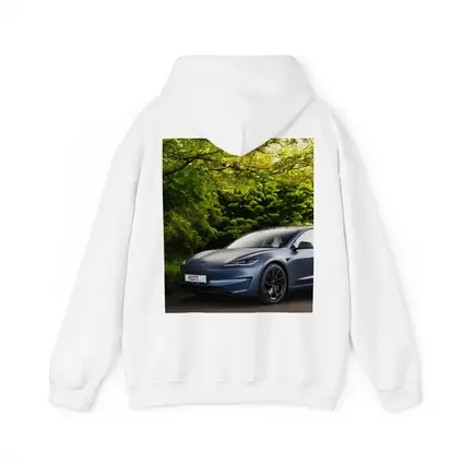 Tesla Model 3 Parked Among Green Trees