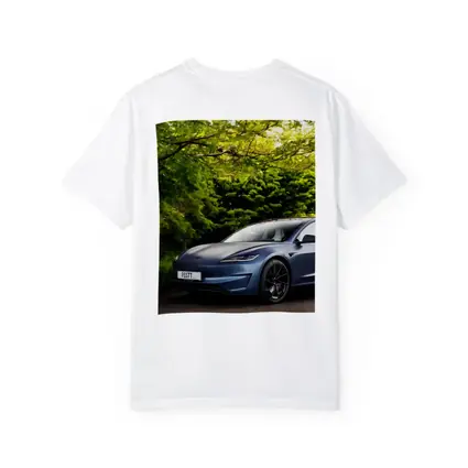 Tesla Model 3 Parked Among Green Trees