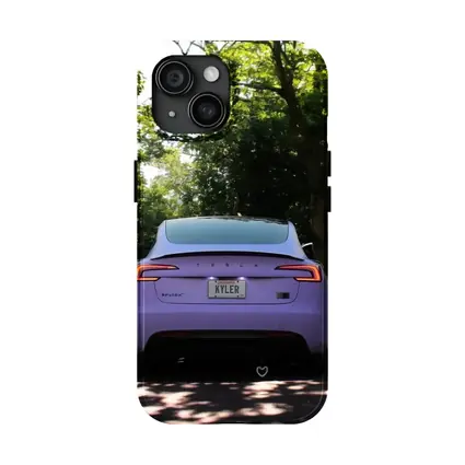 Purple Tesla Model Three Tree Lined Street