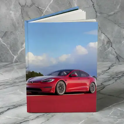 Red Tesla Model S Blue Sky Background