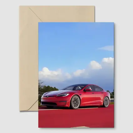 Red Tesla Model S Blue Sky Background