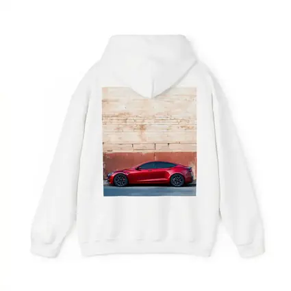 Red Tesla Model S Against Stone Wall