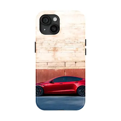 Red Tesla Model S Against Stone Wall