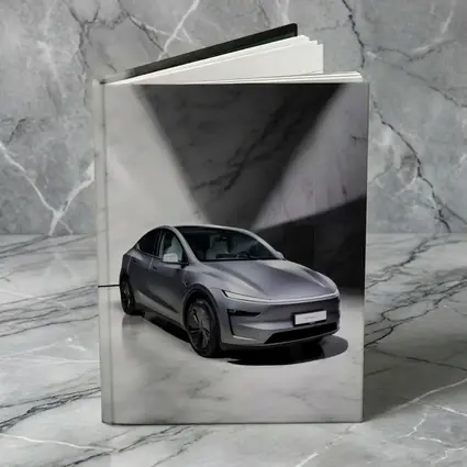 Tesla Model Y Silver Marble Studio Setting