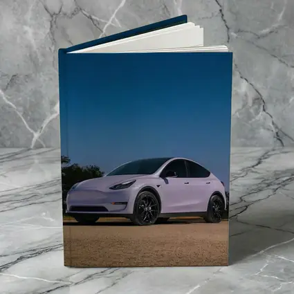 Tesla Model Y Under Deep Blue Night Sky