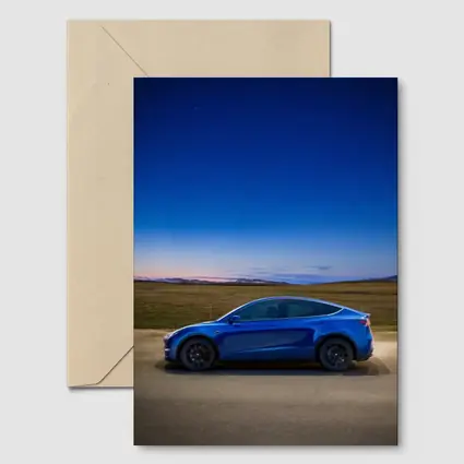 Tesla Model Y Blue Under Starry Night Sky