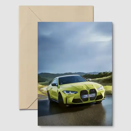 BMW M4 Competition Yellow on Wet Road