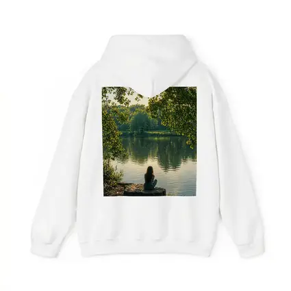 Girl Sitting Alone By Peaceful Lake