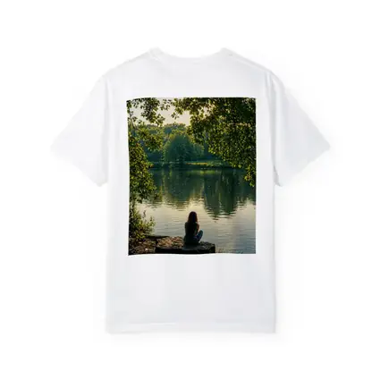Girl Sitting Alone By Peaceful Lake