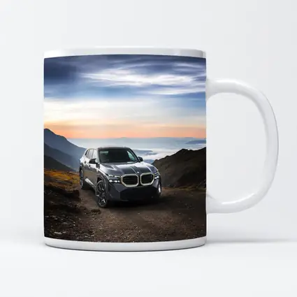 BMW XM SUV Mountain Road Dramatic Sky