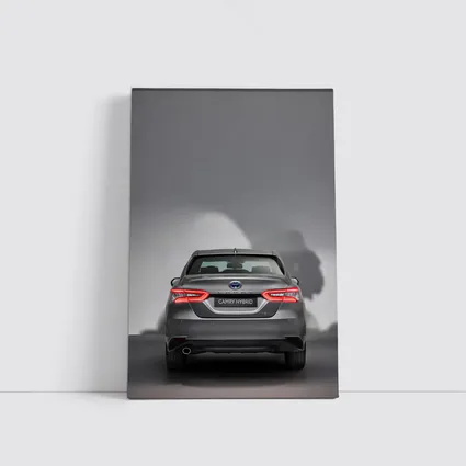 Toyota Camry Hybrid Rear View Gray Background