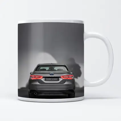 Toyota Camry Hybrid Rear View Gray Background