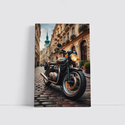 Triumph Motorcycle Parked on European Cobblestone Street