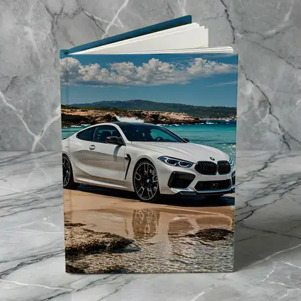 White BMW M8 Parked on Sunny Beach