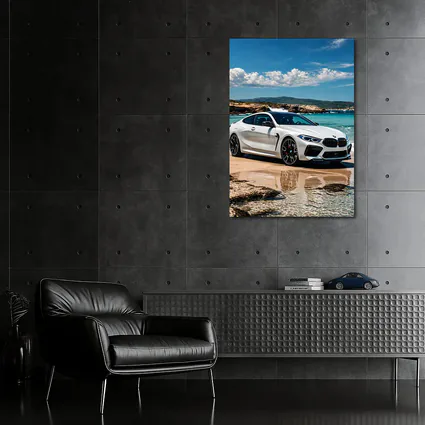 White BMW M8 Parked on Sunny Beach