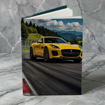Yellow Jaguar F-Type Racing on Track