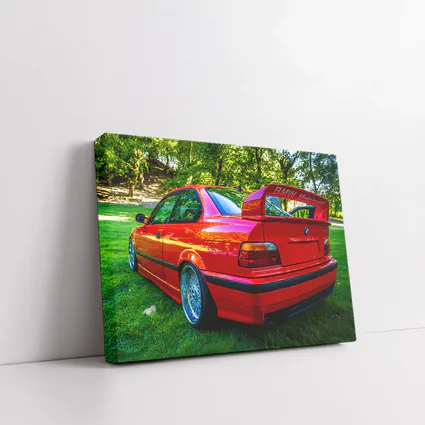 Red BMW M3 E36 Parked on Grass